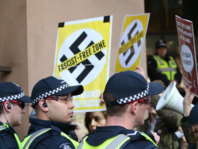 Anti racism protester clash with far right wing supporters  in front of the Melbourne Magistrate court. UPF leader Blair Cottrell and supporters Neil Erikson and Christopher Shortis are facing charges under Victoria's racial vilification laws after a mock beheading of an effigy during protests against a Bendigo mosque in 2015. Monday, Sept 4. 2017. Picture: David Crosling