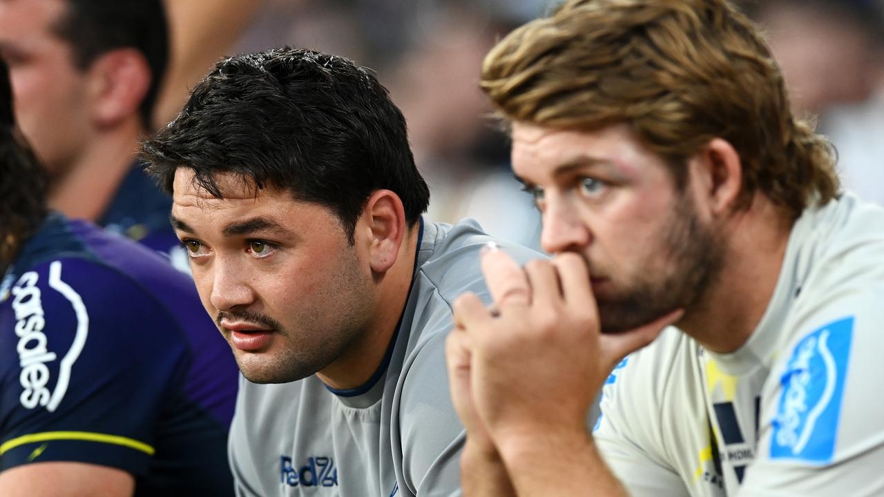 BRISBANE, AUSTRALIA – SEPTEMBER 25: Brandon Smith and Christian Welch of the Storm watch on from the bench during the NRL Preliminary Final match between the Melbourne Storm and the Penrith Panthers at Suncorp Stadium on September 25, 2021 in Brisbane, Australia. (Photo by Bradley Kanaris/Getty Images)