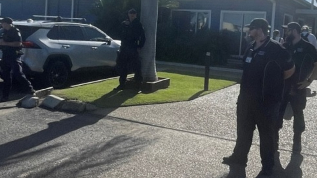 Security guards were posted around the Bundaberg Port Marina as the wedding for Guy Barbera and Katey Mahoney got underway.