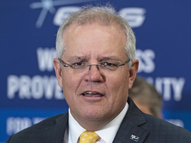 SYDNEY, AUSTRALIA - NewsWire Photos JULY 2: Australian Prime Minister Scott Morrison is pictured as he attends a media opportunity at  defence and space technology company Electro Optic Systems (EOS) in Hume, Canberra. Picture: NCA NewsWire / Terry Cunningham