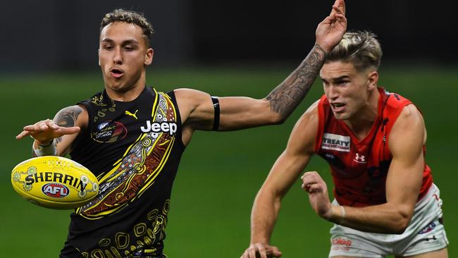 Shai Bolton in action in the 2021 Dreamtime game against Essendon in Perth. Picture: Daniel Carson/AFL Photos via Getty Images