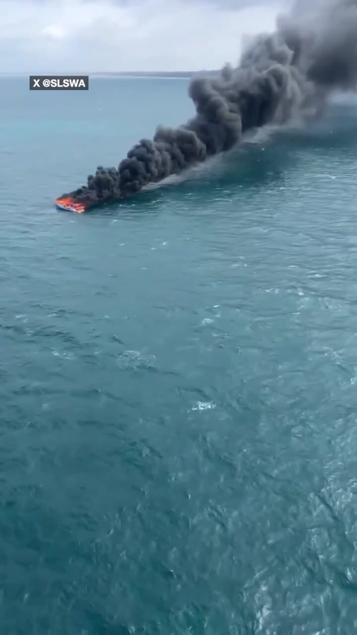 Two people had a lucky escape from a boat fire