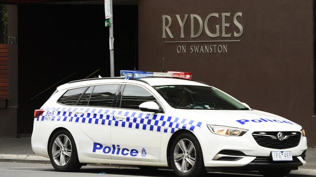 A police car outside the Rydges on Swanston hotel in July. Picture: Quinn Rooney/Getty Images