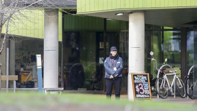 A security guard outside the safe injecting room at North Richmond. Picture: Wayne Taylor