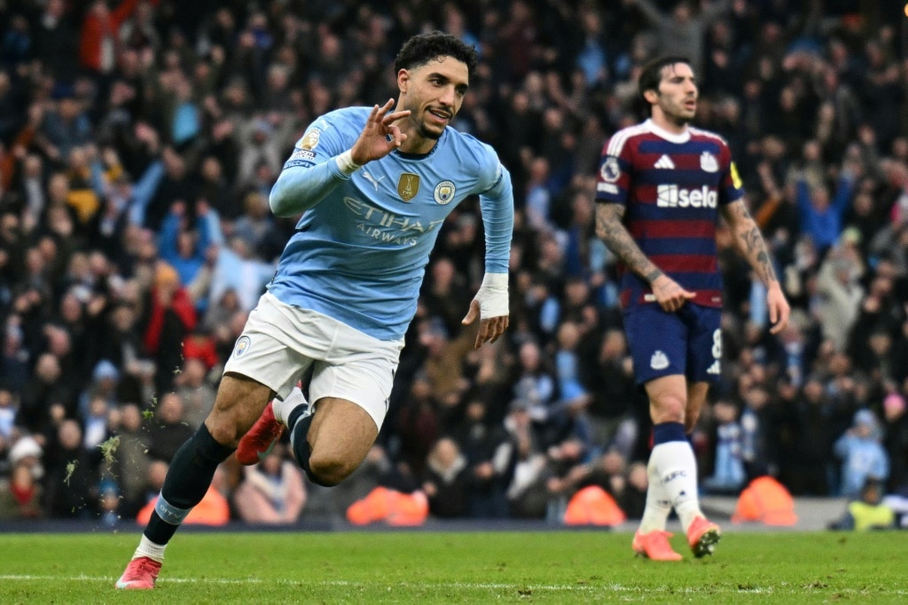 Arsenal close gap on leaders Liverpool, Marmoush treble lifts Man City