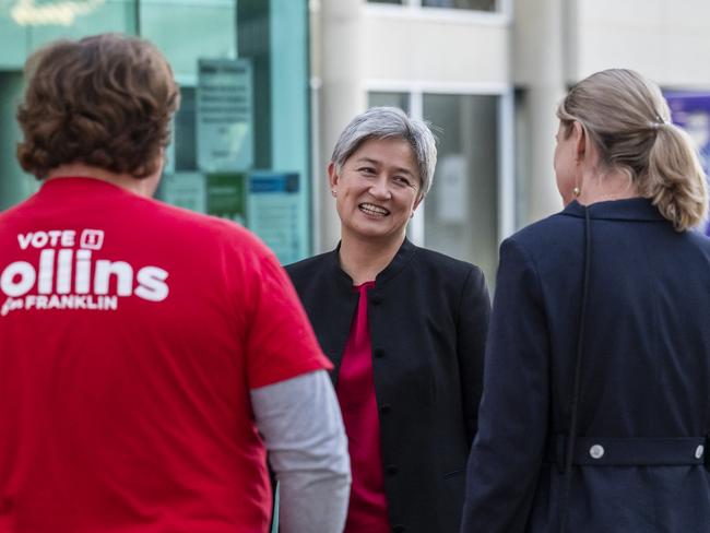 Senator the Hon Penny Wong with Hon Julie Collins MP chatting to supporters Ninja Stadium Polling Centre. Picture: Caroline Tan
