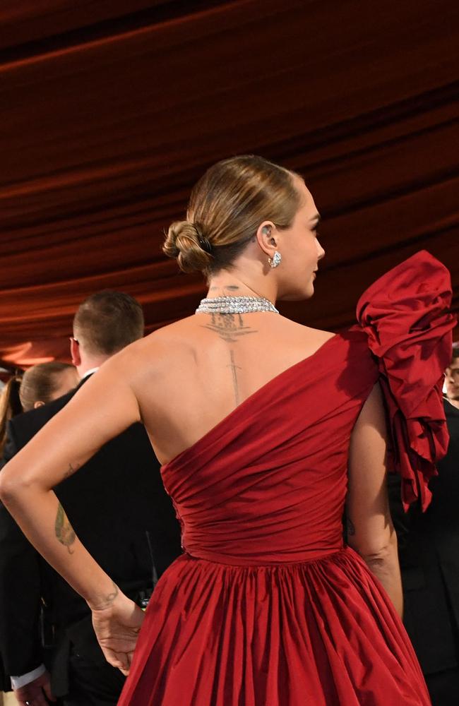 Cara Delevingne stuns in red at Oscars 2023 after rehab reveal NT News