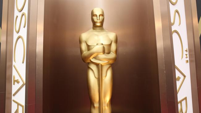 FILE - In this March 2, 2014 file photo, an Oscar statue is displayed at the Oscars at the Dolby Theatre in Los Angeles. Students from the Los Angeles and Compton Unified School Districts will learn what it’s like to work in Hollywood at the first Careers in Film Summit. The daylong event Saturday, Oct. 17, 2015, at the film academy’s Beverly Hills headquarters will showcase various work opportunities on both sides of the camera. (Photo by Matt Sayles/Invision/AP, File)