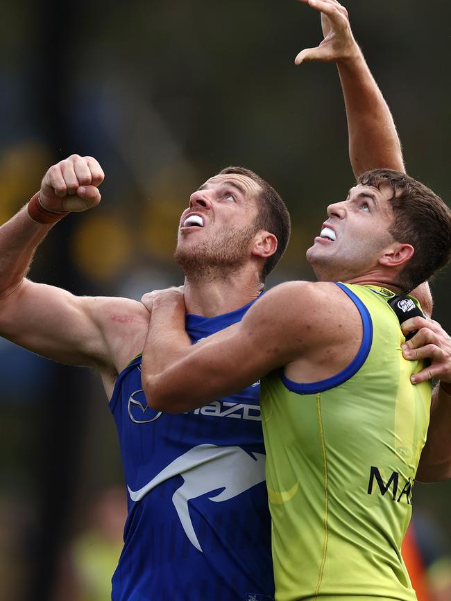 Tristan Xerri (left) and Callum Coleman-Jones battle in the ruck at North Melbourne training. Picture: Michael Klein