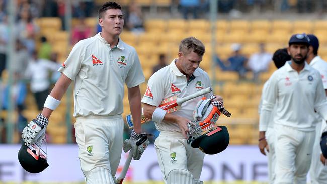 Matt Renshaw with his opening partner David Warner.