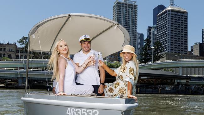 HOLD FOR FUTURE BRISBANE!Jada Cerneka, Alberto Ruiz Lopez and Jacara Desland enjoying a cruise on a GoBoat on the Brisbane River. Picture Lachie Millard