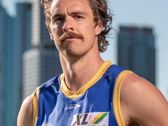 24-08-2021 Brisbane Lions players heading into the 2021 AFL finals campaign pose for photos in front of Brisbane city and Kangaroo point. Joe Daniher. PICTURE: Brad Fleet