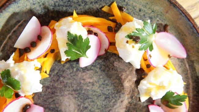 Pickled pumpkin with radish and mozzarella.