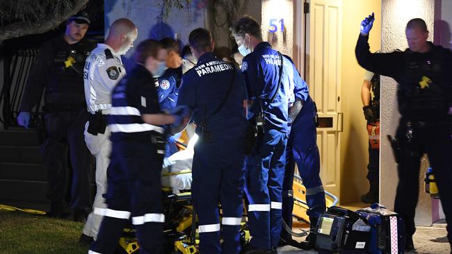 Emergency services at the scene of the stabbing. Picture: Gordon McComiskie