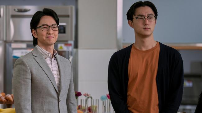 Michael K. Lee as Professor Lee and Peter Thurnwald as Alex star in XO Kitty. Picture: Netflix