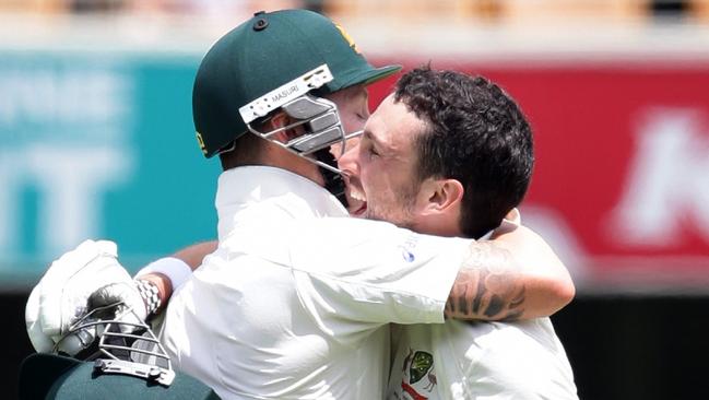 Ed Cowan celebrates scoring a Test century against South Africa with captain Michael Clarke.