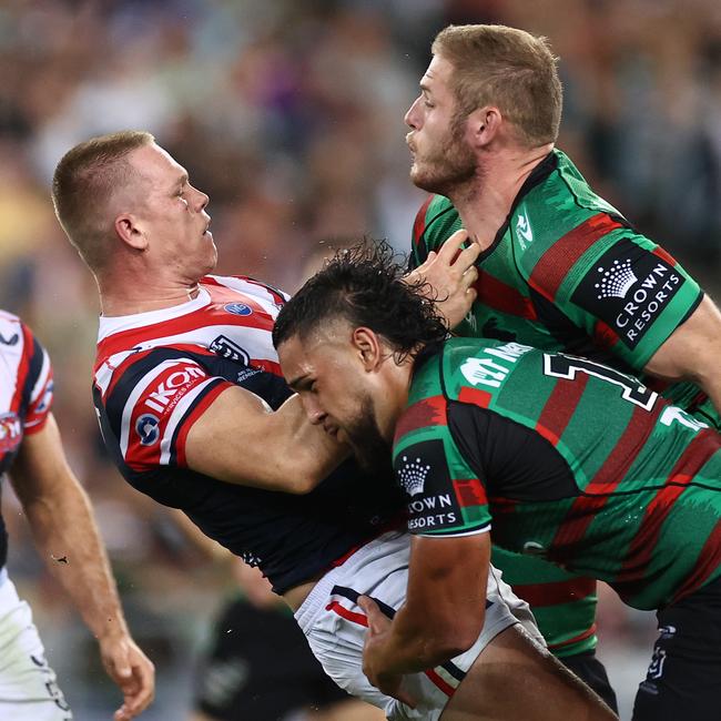 Lindsay Collins of the Roosters was rocked by Keaon Koloamatangi of the Rabbitohs in a big hit. Picture: Cameron Spencer/Getty Images