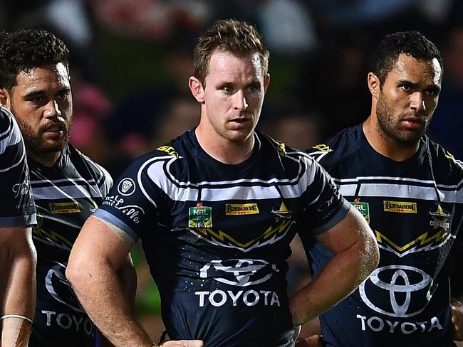 TOWNSVILLE, AUSTRALIA - APRIL 28:  The Cowboys look dejected after a Raiders try during the round eight NRL match between the North Queensland Cowboys and the Canberra Raiders at 1300SMILES Stadium on April 28, 2018 in Townsville, Australia.  (Photo by Ian Hitchcock/Getty Images)