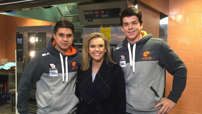 Sunrise weather presenter Edwina Bartholomew with GWS Giants players Jarrod Pickett (left) and Matthew Kennedy (right) supporting DoSomething Day at St Johns Park Bowling Club.