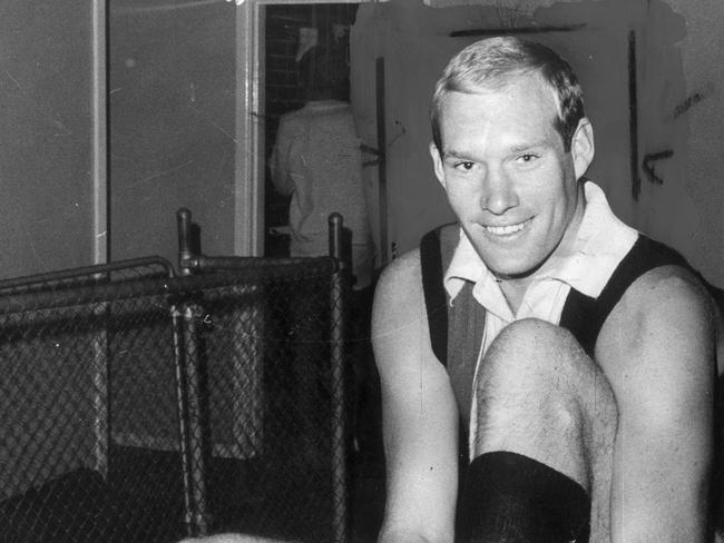 08/07/1969. Carl Ditterich laces up a new pair of football boots before St Kilda training at Moorabbin. Australian Rules Football.  Neg no: BD15244.