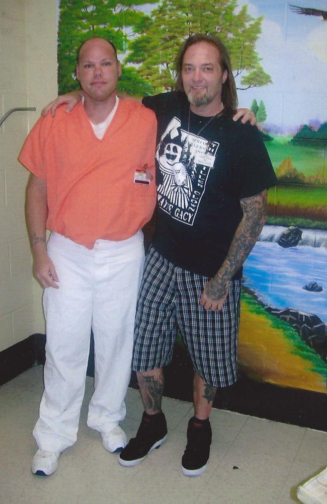 Eric Holler, owner of Serial Killer Ink, pictured with the Salerno Strangler.