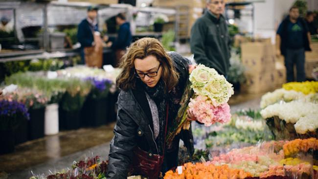 Antonia checks out the morning markets. Photo:©JK Blackwell, www.twoguineapigs.com.au