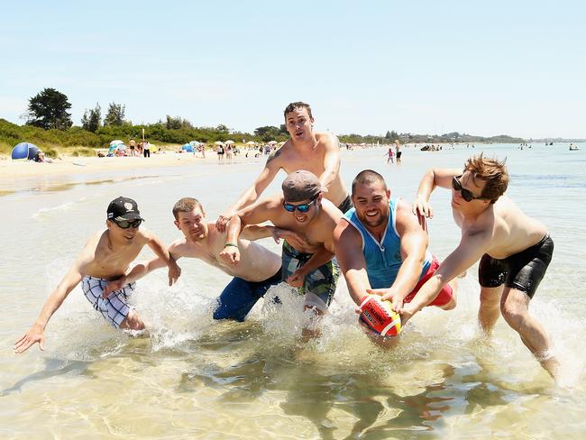 (Left – Right) Chris Venn, Dean Jones, James Hyde, Aaron O'Mara and Jake Robertson of East Bentleigh enjoy Rye beach on December 31, 2012. Picture: Hamish Blair