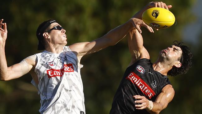 Brodie Grundy battles with Mason Cox at Magpies training. Picture: Mike Owen/Getty Images