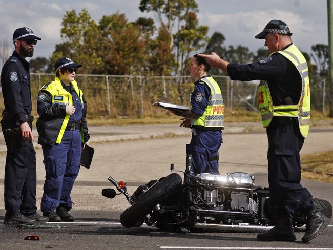 Crash Investigation Unit officers in Western Sydney at the scene of a deadly crash. Picture: Sam Ruttyn.