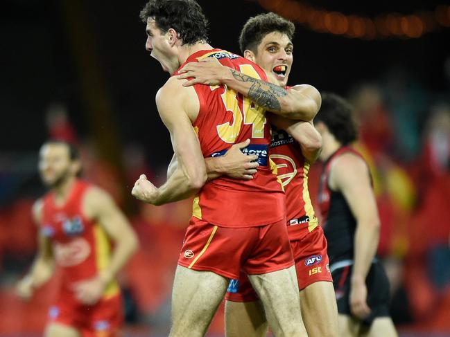 A fired up Ben King celebrates kicking a big goal.