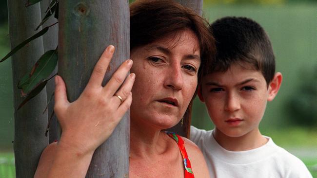 Shooting victim, Barbara “Basia” Hellwich and son, Bodein, in 1998. Bodein was in her arms when William Kelvin Fox shot her three times in 1992 at her Miami caravan.