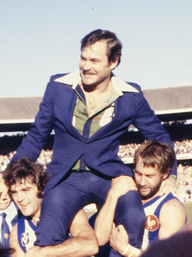 North Melbourne coach Ron Barassi is chaired off the ground following the 1977 grand final win over Collingwood.