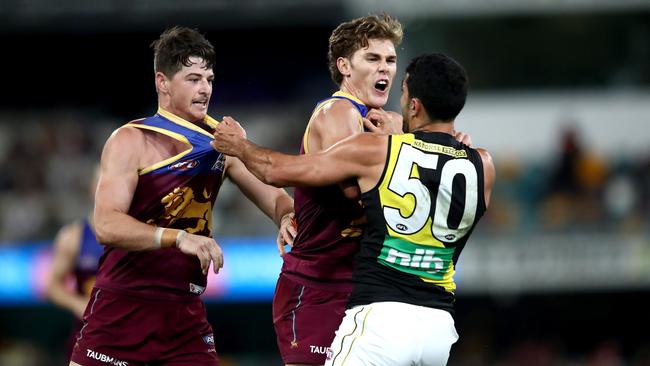 Brisbane players remonstrate with Marlion Pickett. Picture: AFL Photos/Getty Images