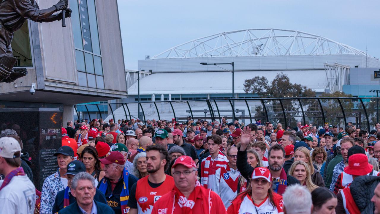 Fans leave the MCG after the Grand Final between the Sydney Swans and Brisbane Lions. Picture: NewsWire/Nadir Kinani