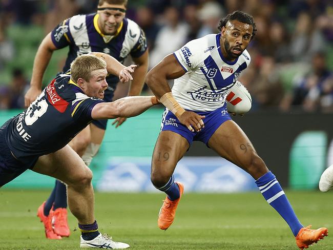 MELBOURNE, AUSTRALIA - MARCH 11: Josh Addo-Carr of the Bulldogs runs with the ball during the round two NRL match between the Melbourne Storm and Canterbury Bulldogs at AAMI Park on March 11, 2023 in Melbourne, Australia. (Photo by Daniel Pockett/Getty Images)