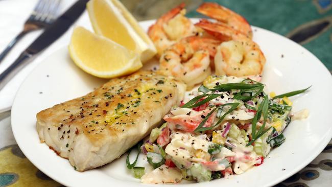 Fresh Coral Seafood’s Grilled Snapper with seafood salad. Photo by Richard Gosling