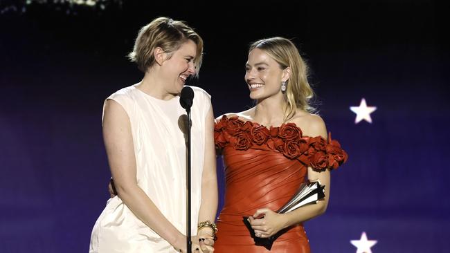 (L-R) Greta Gerwig and Margot Robbie accept the Best Comedy Award for "Barbie" onstage during the 29th Annual Critics Choice Awards. Photo by Kevin Winter/Getty Images.