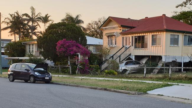 A woman has been taken into custody after allegedly crashing into a house on Lucas Street,Â Berserker, on October 9, 2021. Picture: Aden Stokes