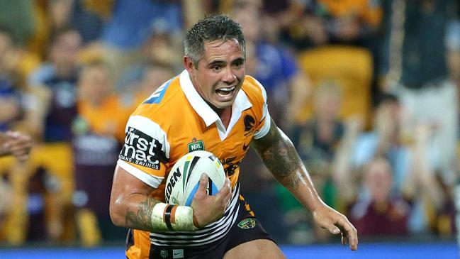 Broncos Corey Parker runs for his second try. The Brisbane Broncos vs the North Queensland Cowboys at Suncorp Stadium. Pic Peter Wallis