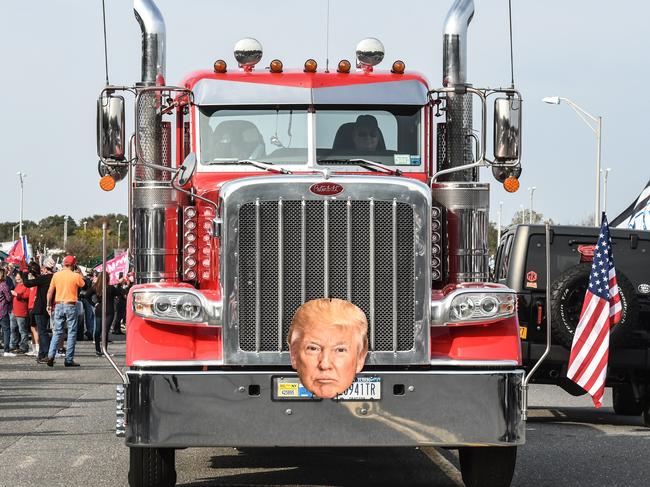 A truck with a picture of Donald Trump drives through a pro-Trump rally on October 11, 2020 in Ronkonkoma, New York. Picture: Stephanie Keith/Getty Images/AFP