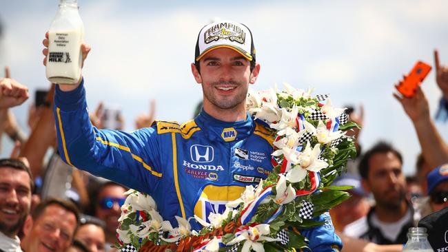 Alexander Rossi after winning the 100th running of the Indianapolis 500 at Indianapolis Motorspeedway on May 29, 2016 in Indianapolis, Indiana. Chris Graythen/Getty Images/AFP