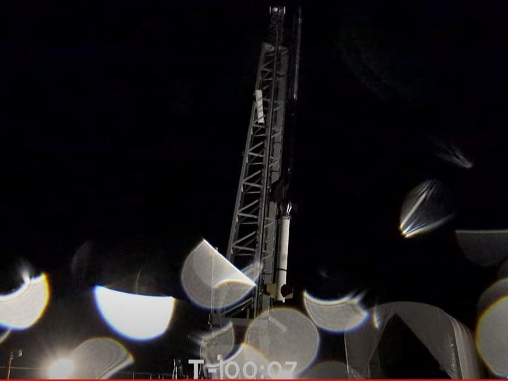 The rocket on the launch pad at T minus 7 seconds in the countdown. The white flecks on the picture are drops of rain, which delayed the launch for some time overnight. Image: Equatorial Launch Australia/Supplied