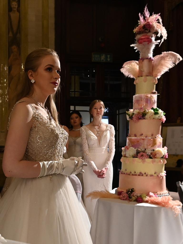 While there’s not a ‘diamond’, several girls are chosen to cut the ceremonial Queen Charlotte cake. Picture: Kate Green/Getty Images