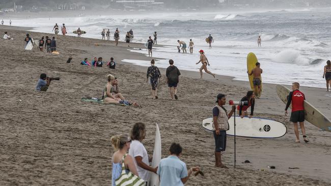 Tourists at Canggu Beach in Bali this week. Picture: Johannes P. Christo