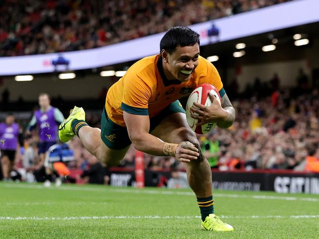 Len Ikitau scores a try against Wales. Picture: Getty Images