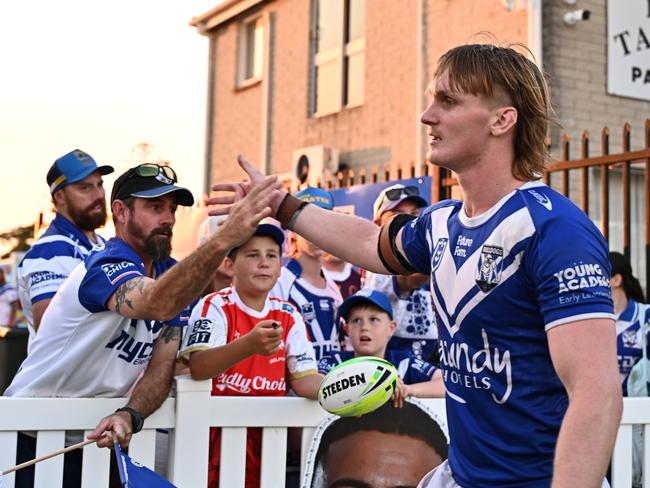 Bulldogs star Jacob Preston with fans after the win against the Dolphins in Bundaberg. Picture: Getty Images