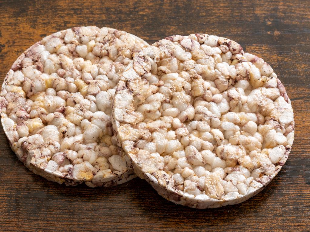 Rice cakes, although low in calories, don’t deliver much satisfaction alone. Picture: iStock