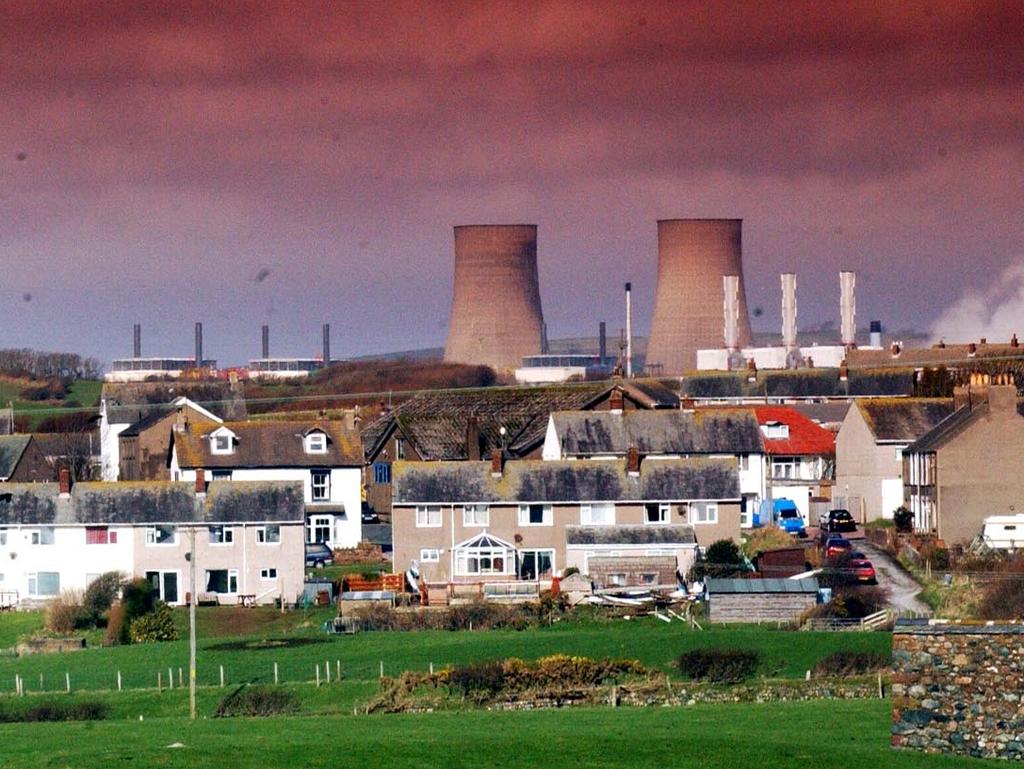 Seascale village in Cumbria, England with the Sellafield Nuclear Power Plant visible in the background.