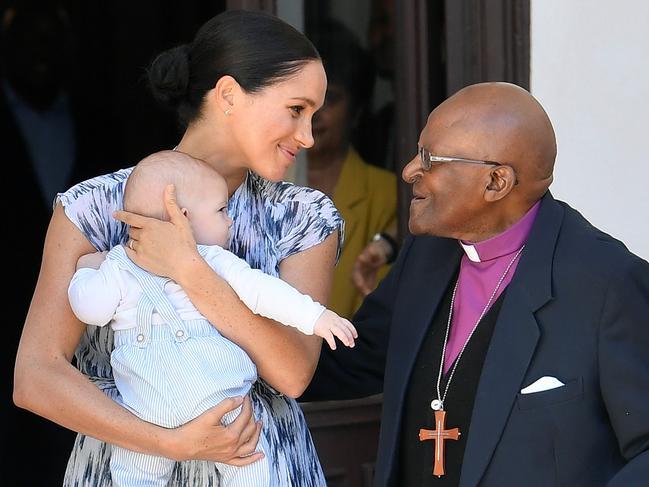 Archbishop Desmond Tutu is a fan of baby Archie who wore adorable dungarees during the royal engagement. Photo: Toby Melville