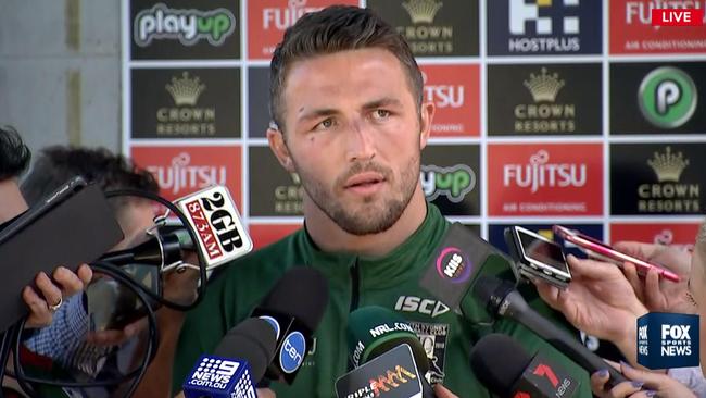 Sam Burgess faces the media regarding the sexting scandal engulfing South Sydney.